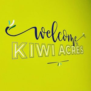 welcome sign for Kiwi Acres at Kiwi Creative